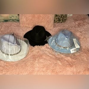 Three Women's Wide Brim Felt Fedora Panama Hats for sale.